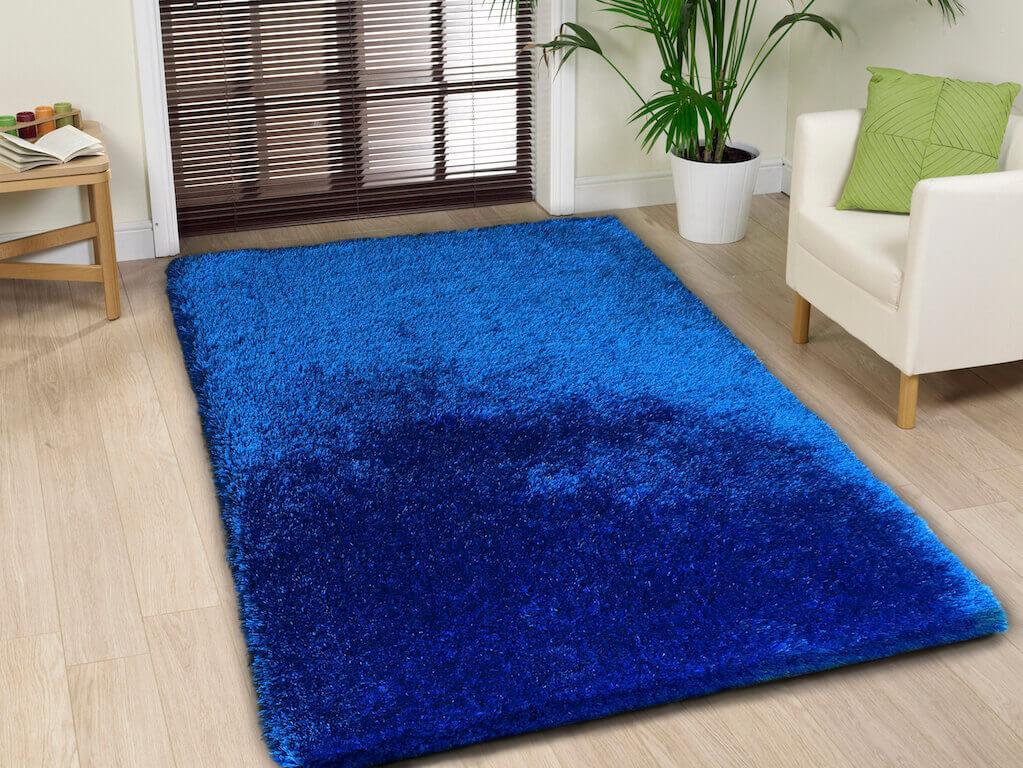 Chubby Blue Area Rug showcasing a soft shaggy texture in solid blue color, perfect for home decor.