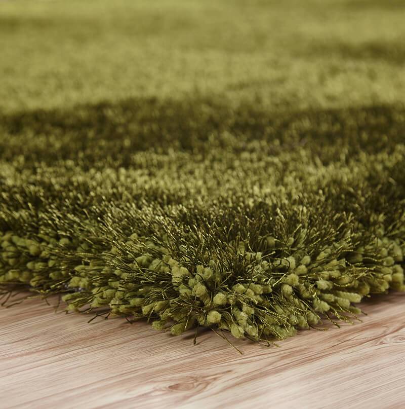 Chubby Green Area Rug showcasing a soft shaggy texture in solid green color, perfect for home decor.