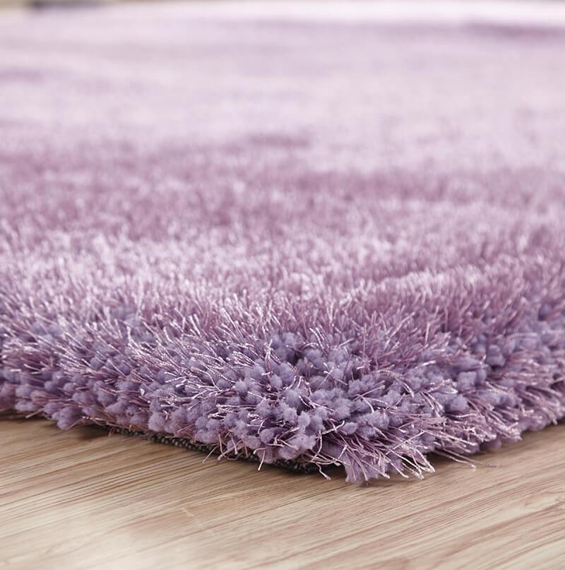 Chubby Lavender Area Rug showcasing soft shaggy texture in a cozy living space, available in two sizes.