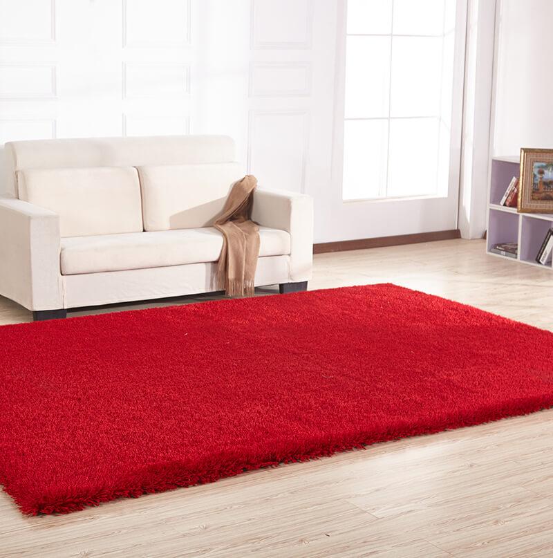 Chubby Red Area Rug showcasing a soft shaggy texture, hand-tufted design, and vibrant red color, perfect for home decor.