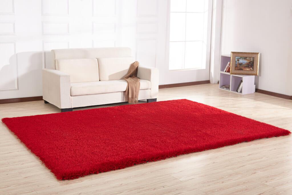 Chubby Red Area Rug showcasing a soft shaggy texture, hand-tufted design, and vibrant red color, perfect for home decor.