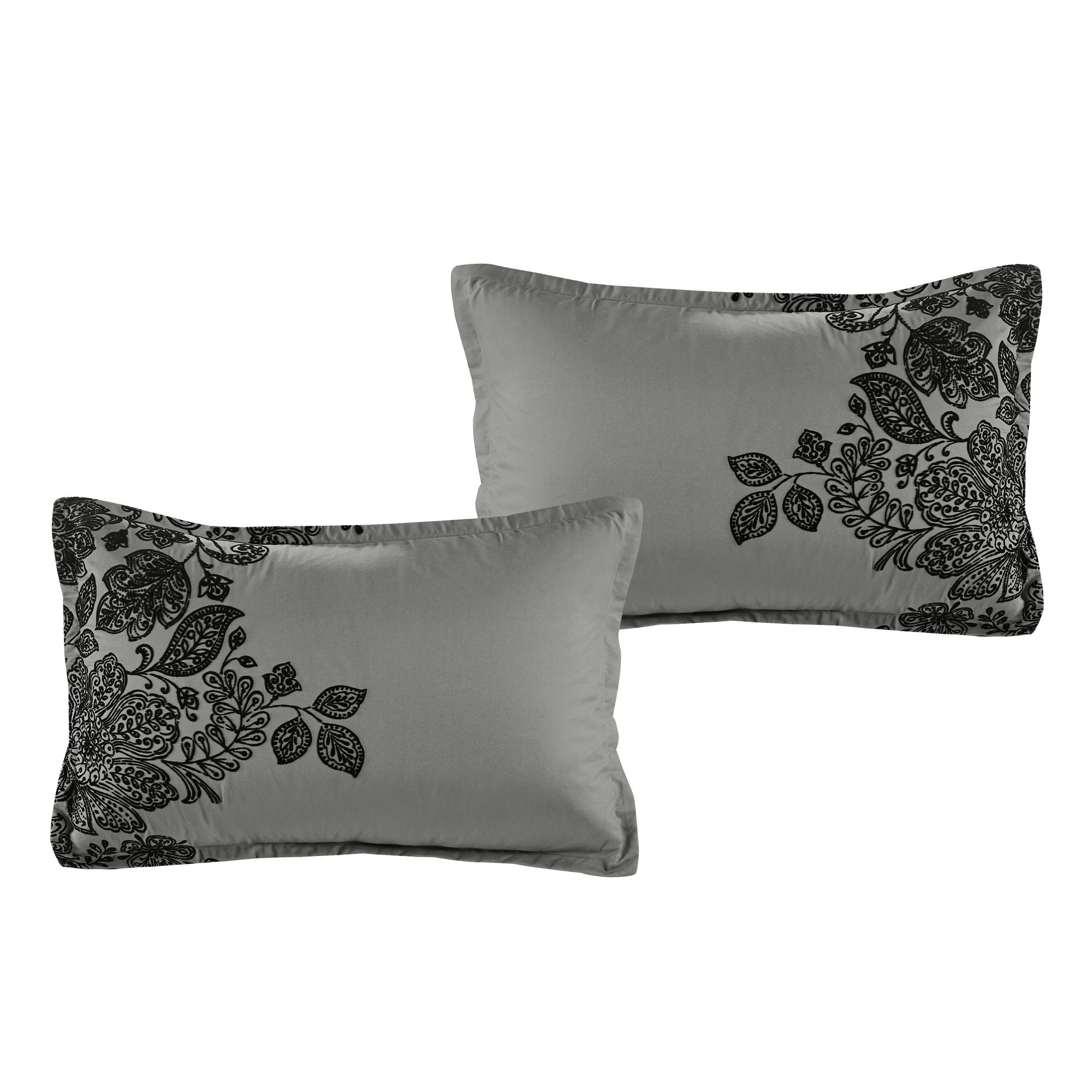 Chuki Contemporary Floral Black Comforter Set featuring elegant jacquard fabric with floral and medallion patterns, displayed on a neatly made bed.