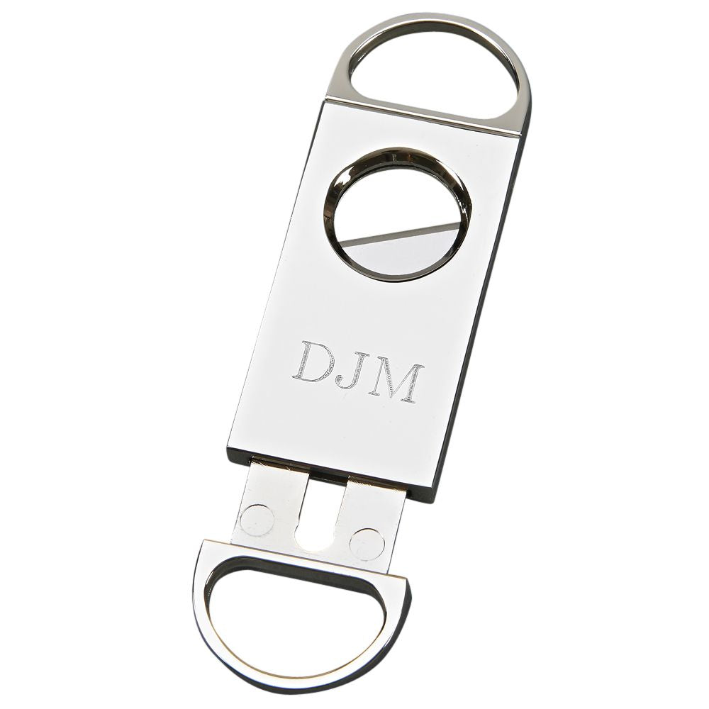 A sleek and stylish cigar cutter with a nickel plated finish, designed for precision cutting.