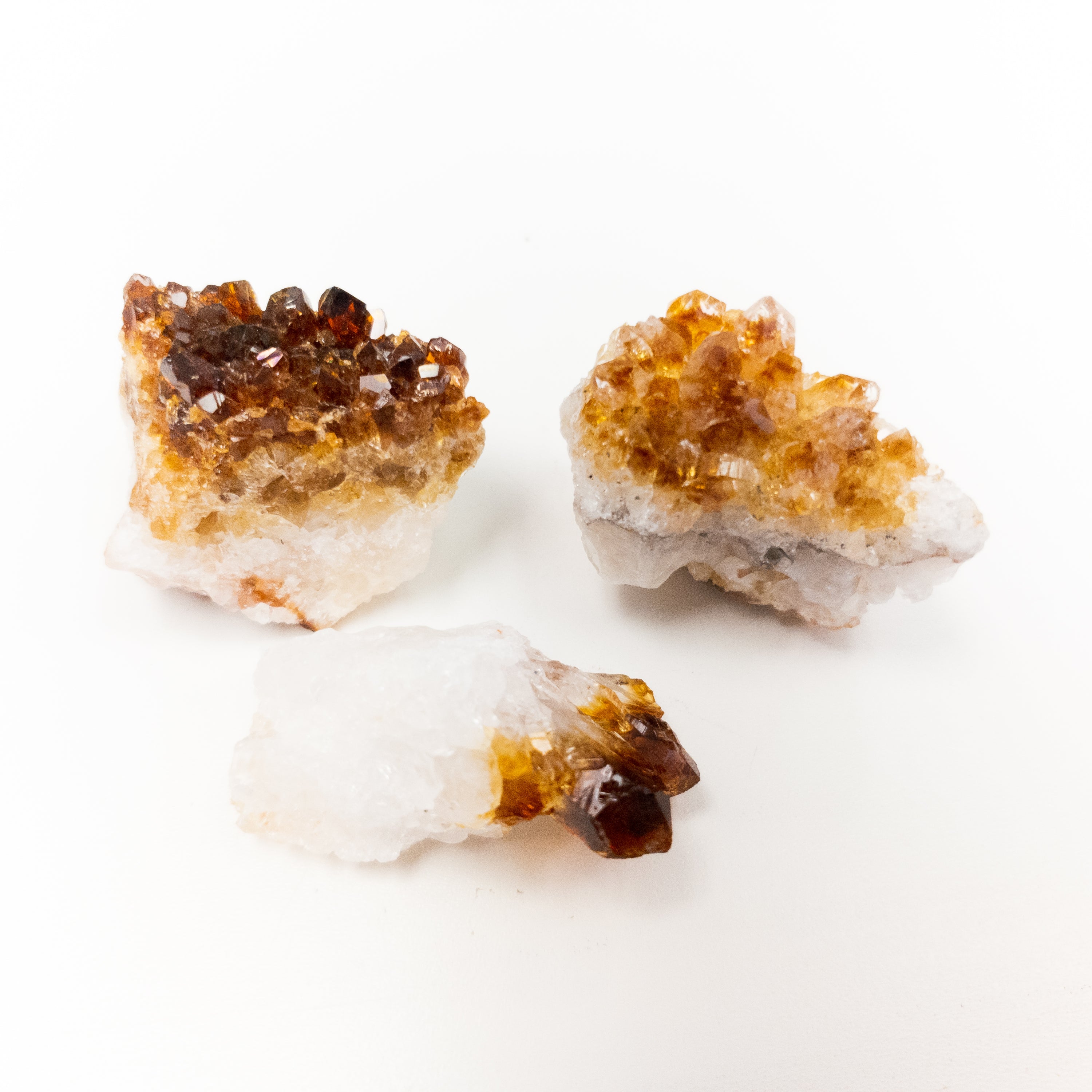 A beautiful citrine druzy crystal with sparkling golden hues, measuring between 1-4 inches, perfect for home or office decor.