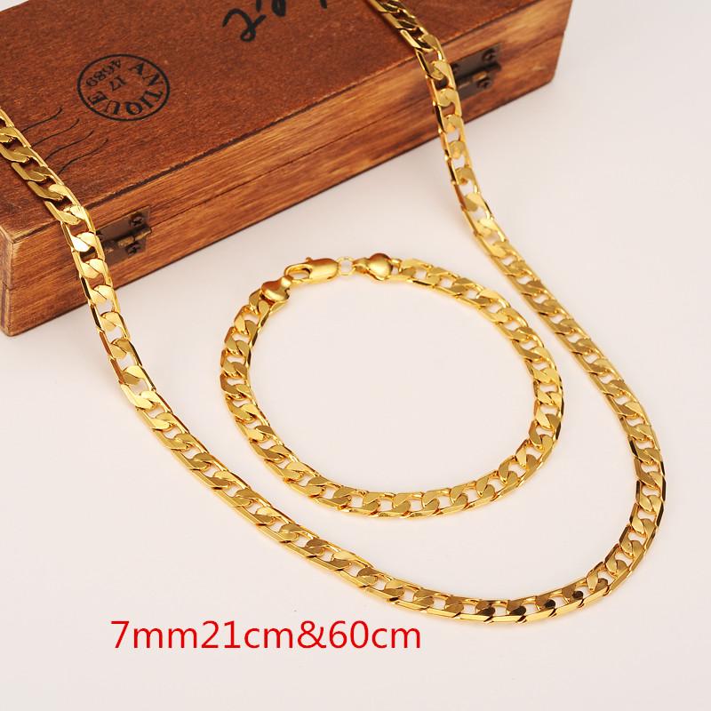 Classic Cuban Link Chain Necklace and Bracelet Set in fine 18K solid gold, showcasing a luxurious and durable design.