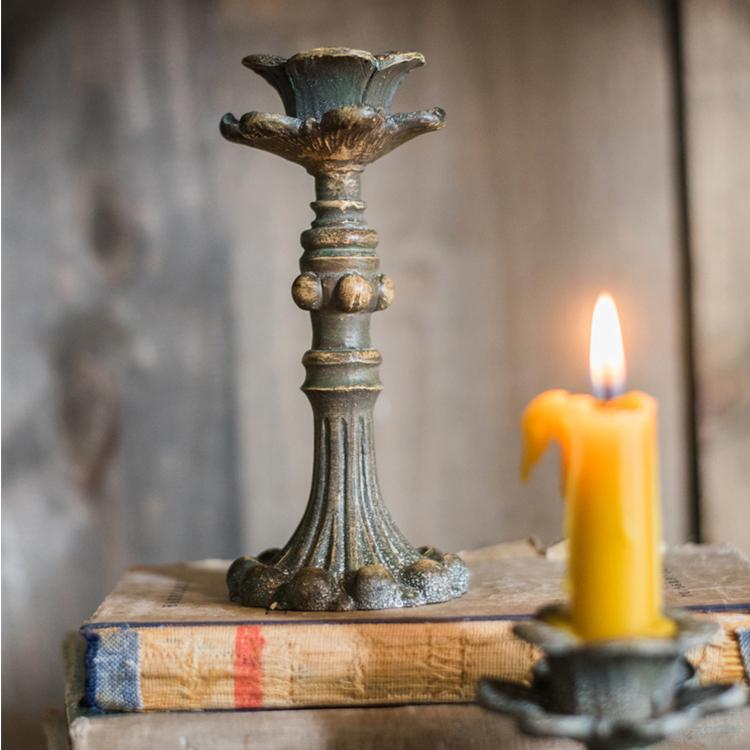 Classic French Candlestick Holder in bronze and rust color, showcasing elegant design and resin material.