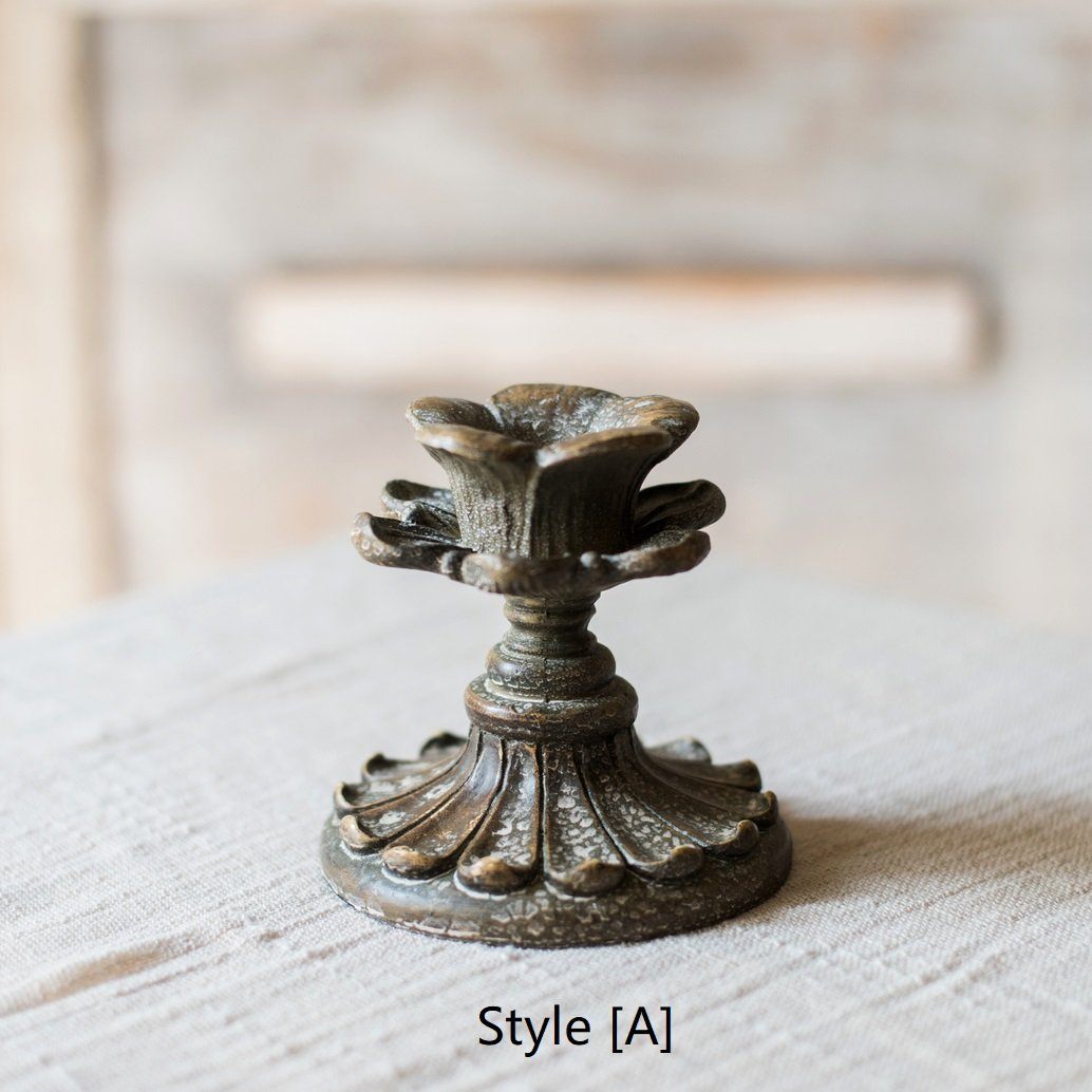 Classic French Candlestick Holder in bronze and rust color, showcasing elegant design and resin material.