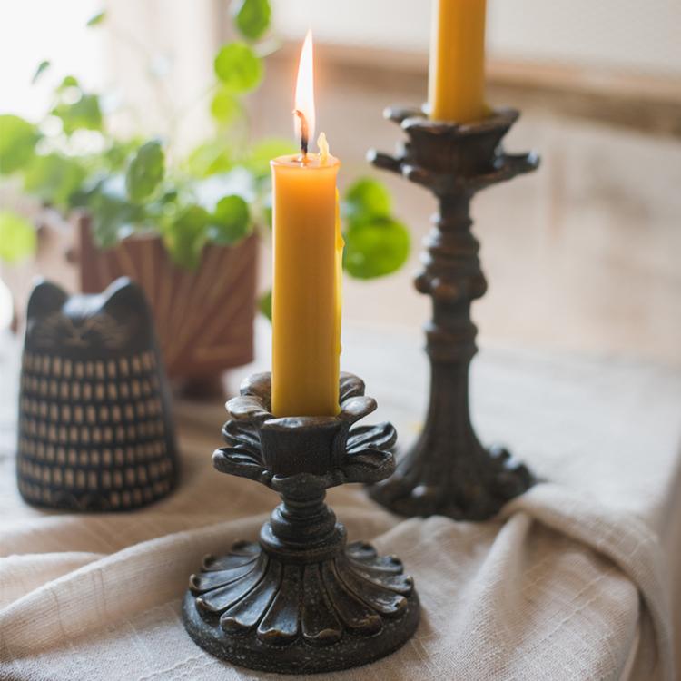 Classic French Candlestick Holder in bronze and rust color, showcasing elegant design and resin material.