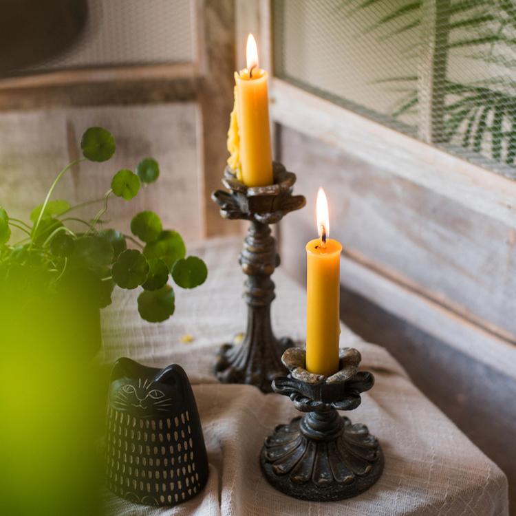 Classic French Candlestick Holder in bronze and rust color, showcasing elegant design and resin material.