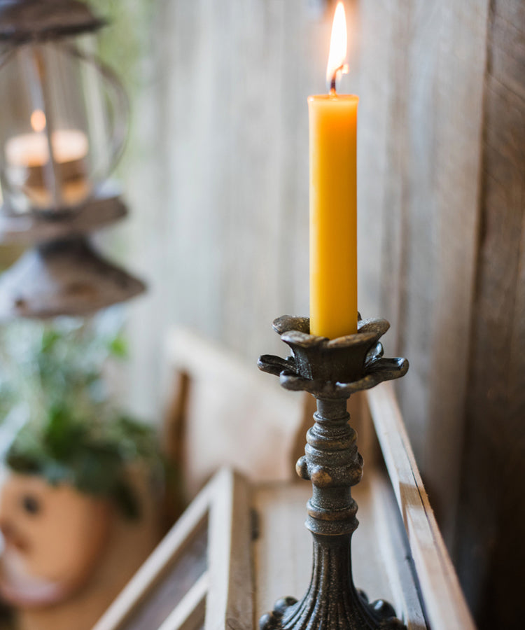 Classic French Candlestick Holder in bronze and rust color, showcasing elegant design and resin material.