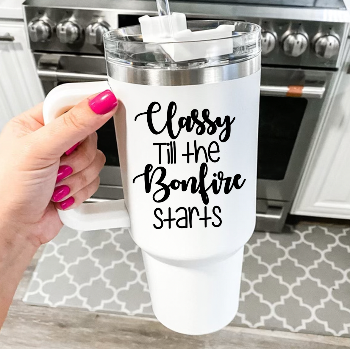 Classy Till The Bonfire Starts 40oz Travel Mug in white stainless steel with removable handle and straw-friendly lid.