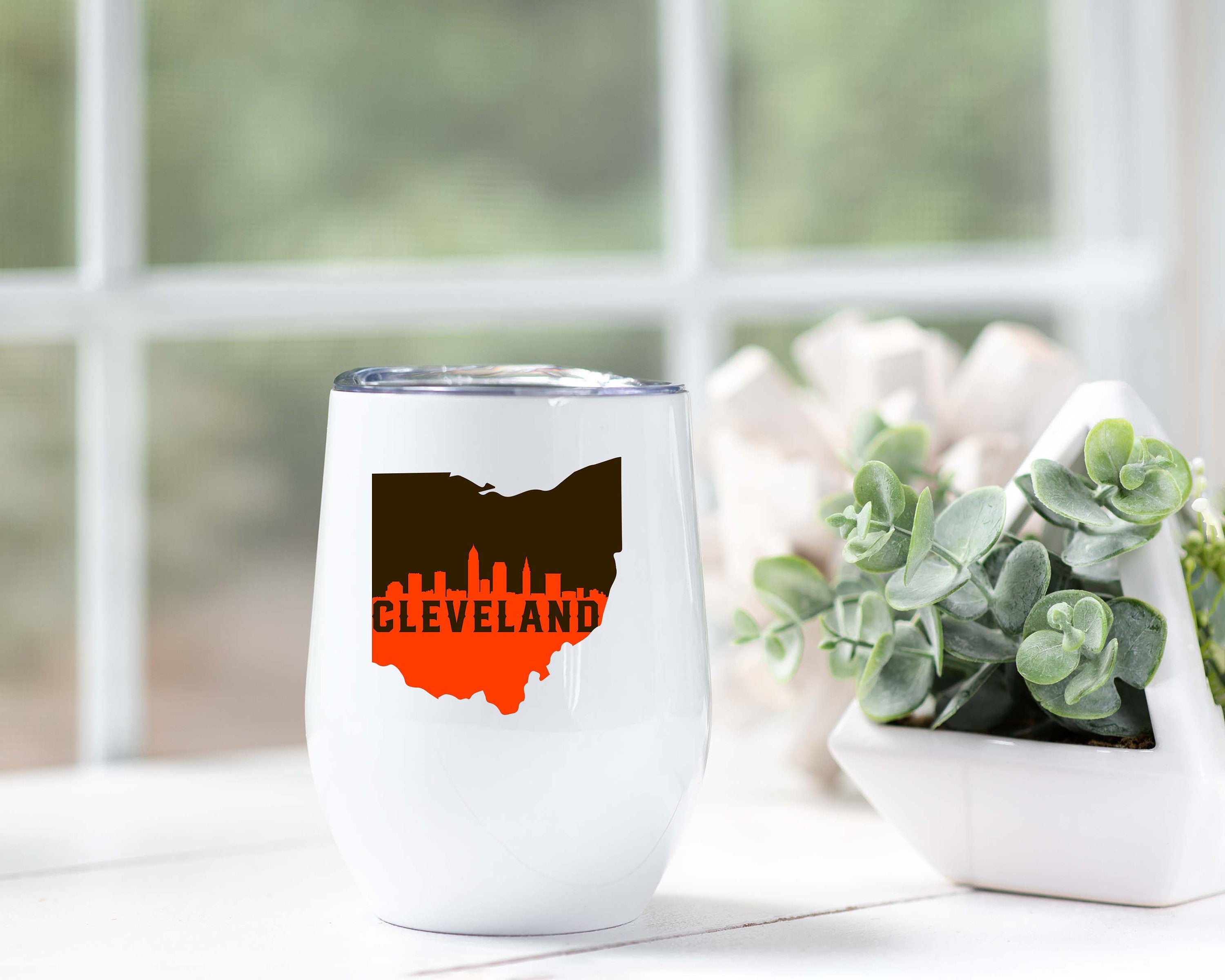 Cleveland Skyline Wine Tumbler featuring the Browns logo, insulated stainless steel with a stylish design and secure lid.