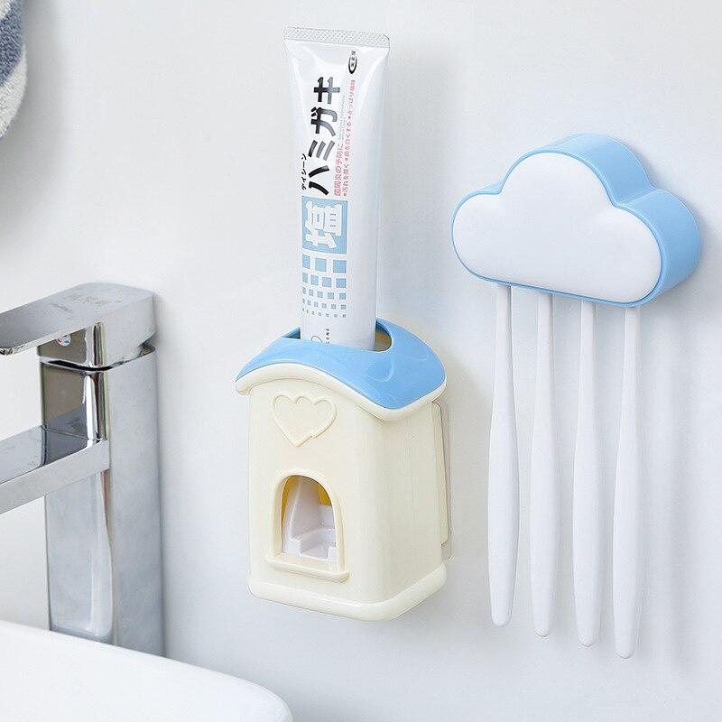 A stylish cloud-shaped toothbrush holder with a built-in toothpaste dispenser, designed for kids' bathrooms.