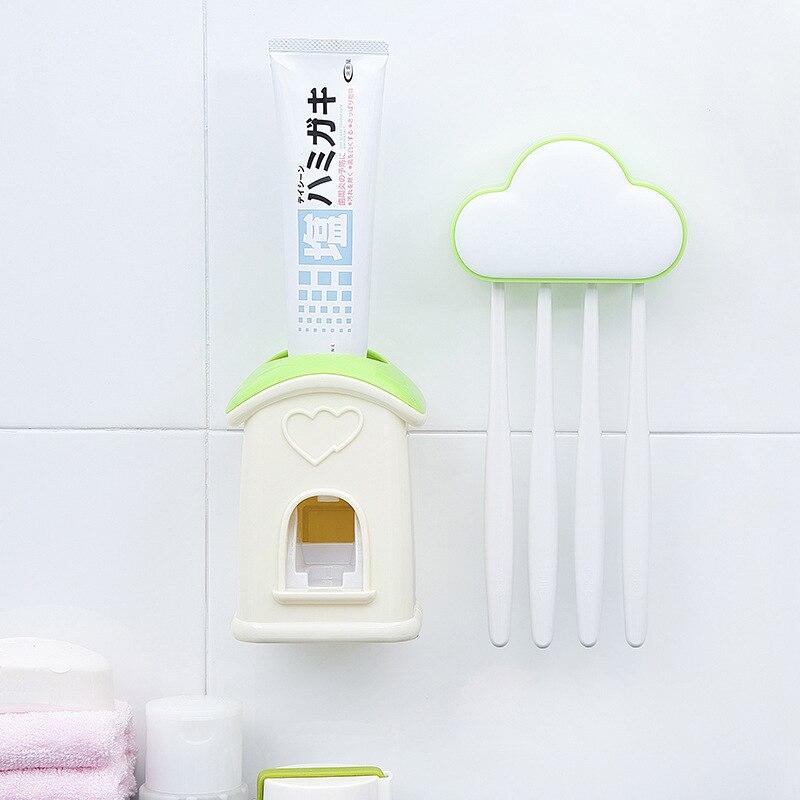 A stylish cloud-shaped toothbrush holder with a built-in toothpaste dispenser, designed for kids' bathrooms.