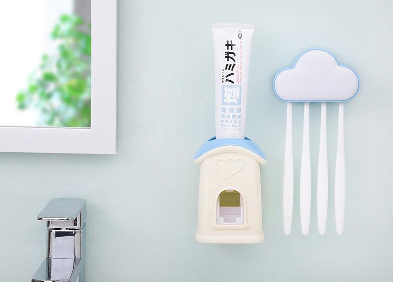 A stylish cloud-shaped toothbrush holder with a built-in toothpaste dispenser, designed for kids' bathrooms.