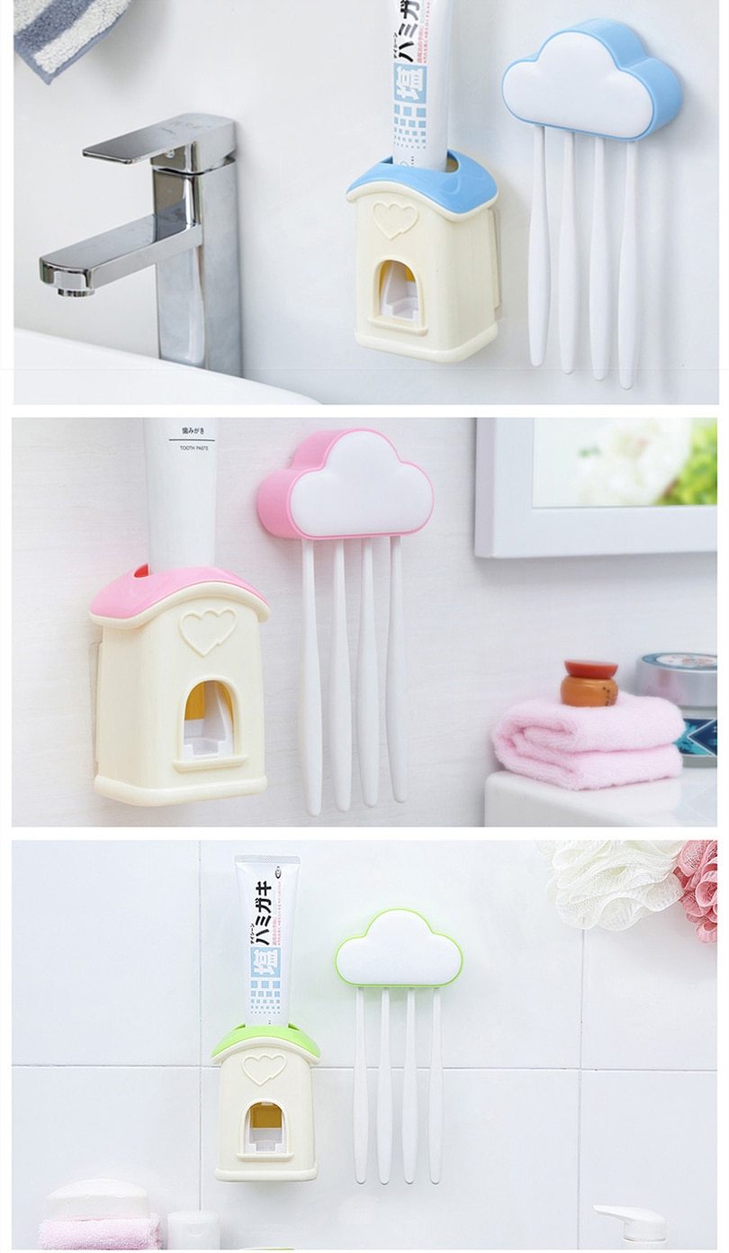 A stylish cloud-shaped toothbrush holder with a built-in toothpaste dispenser, designed for kids' bathrooms.