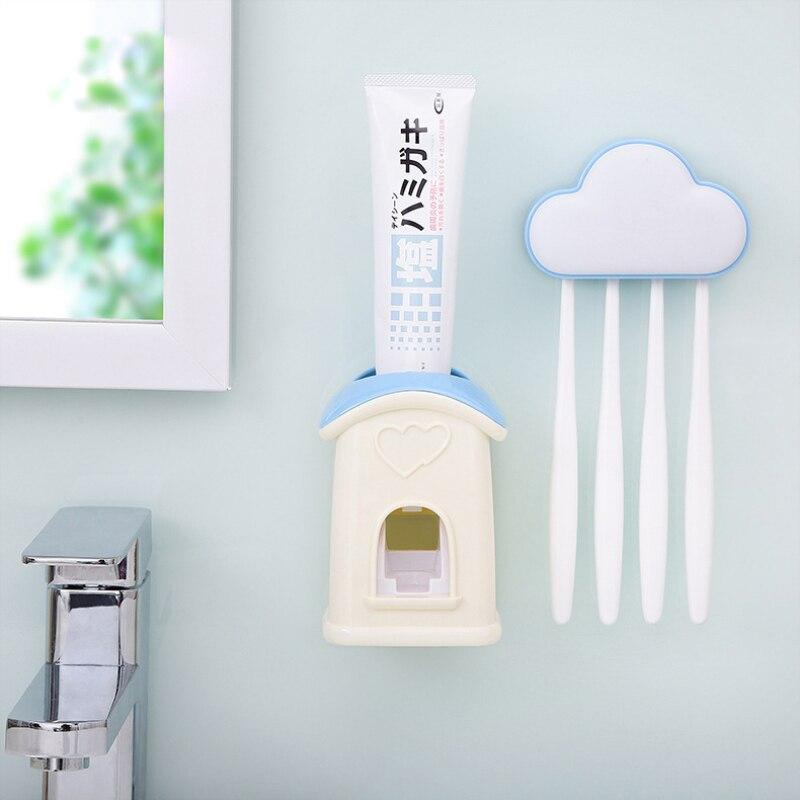 A stylish cloud-shaped toothbrush holder with a built-in toothpaste dispenser, designed for kids' bathrooms.