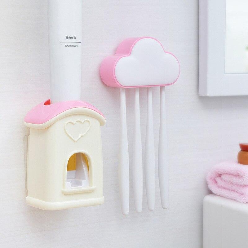 A stylish cloud-shaped toothbrush holder with a built-in toothpaste dispenser, designed for kids' bathrooms.