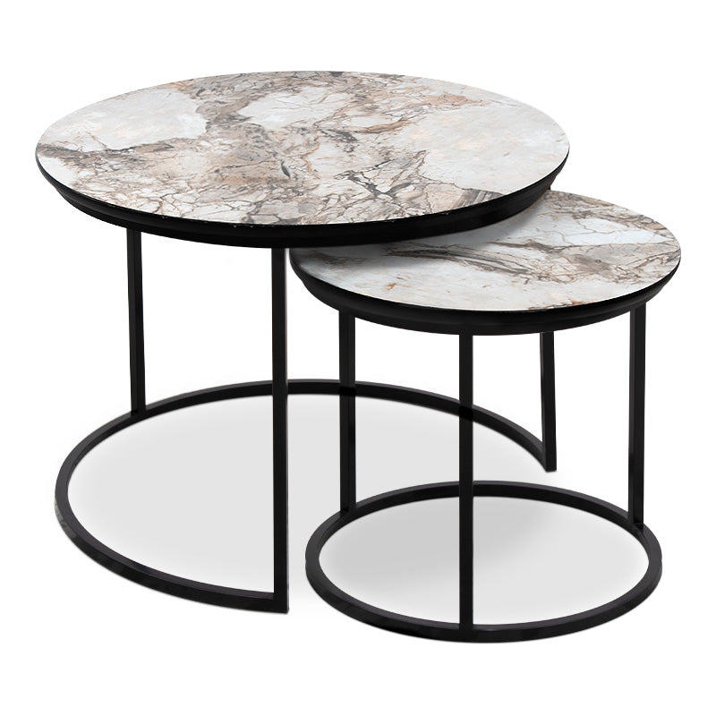 JULIUS Coffee Table Set featuring beige marble effect and black metal base, showcasing two round tables in a stylish living room setting.