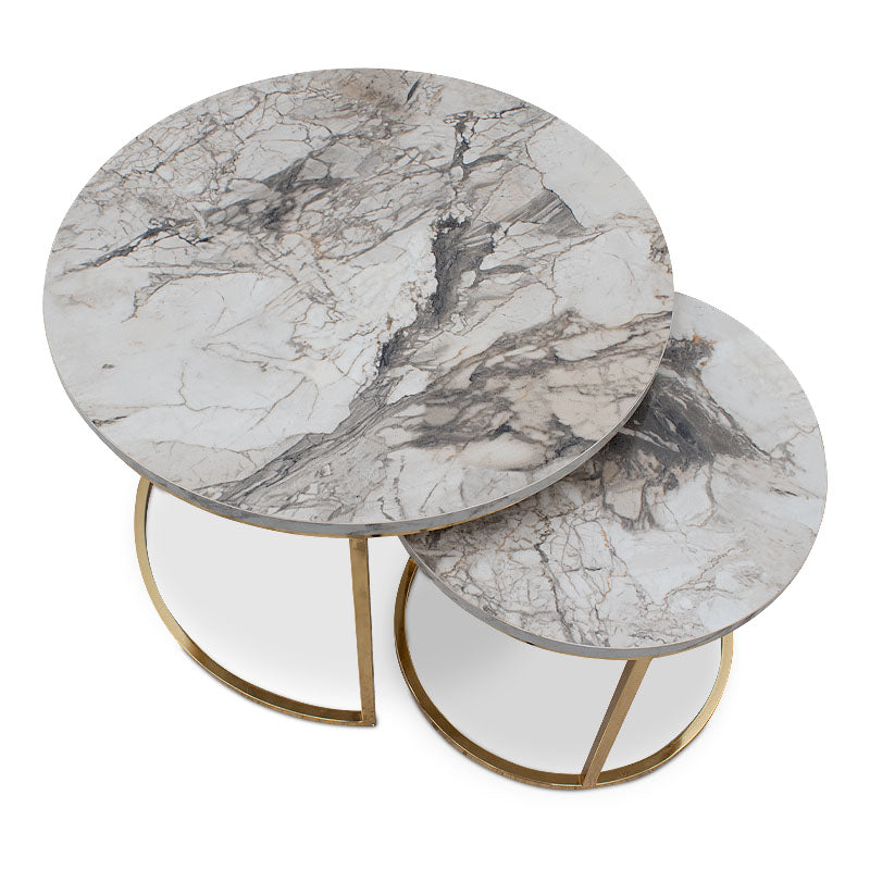 JULIUS Coffee Table Set featuring beige marble effect and gold metal base, showcasing two round tables in a stylish living room setting.