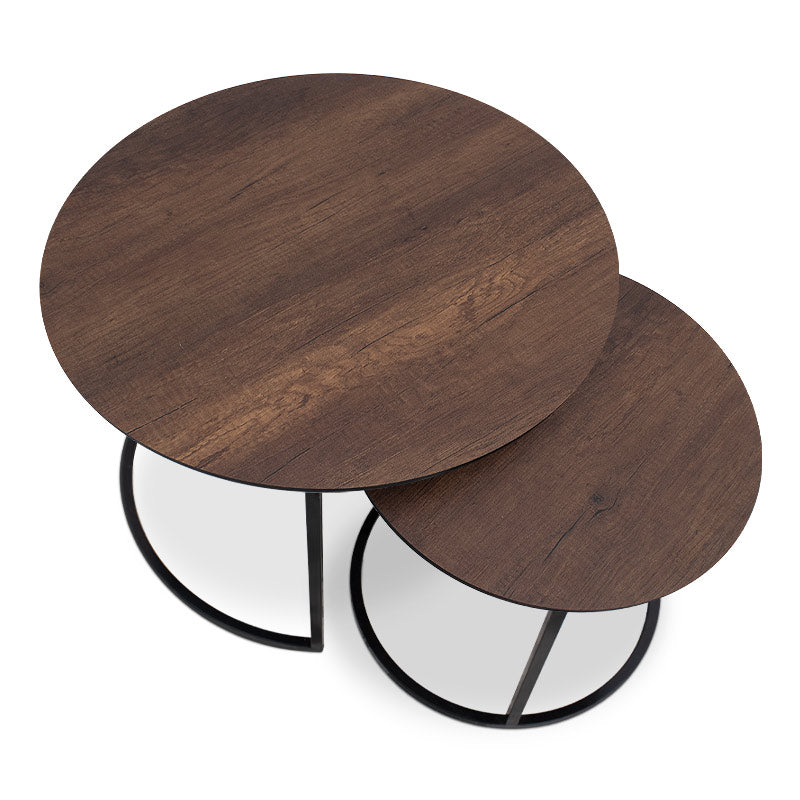 JULIUS Coffee Table Set in walnut finish featuring two round tables, one large and one small, with a black metal base.