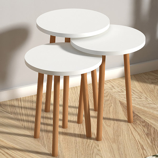 TINA White Coffee Table Set featuring three tables of varying sizes, made from melamine with solid beech wood legs.