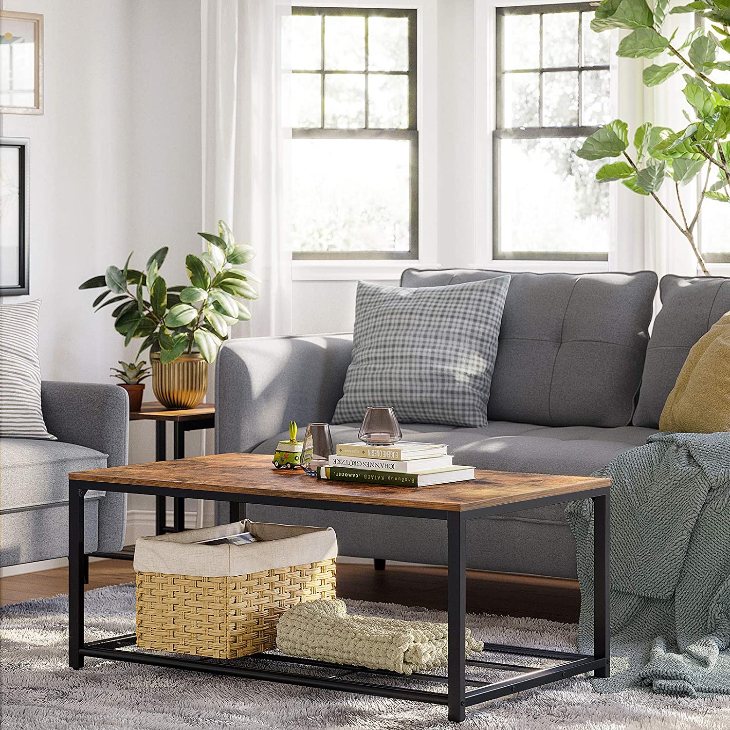 Rustic brown coffee table with dense mesh shelf and black iron legs, perfect for living room decor.