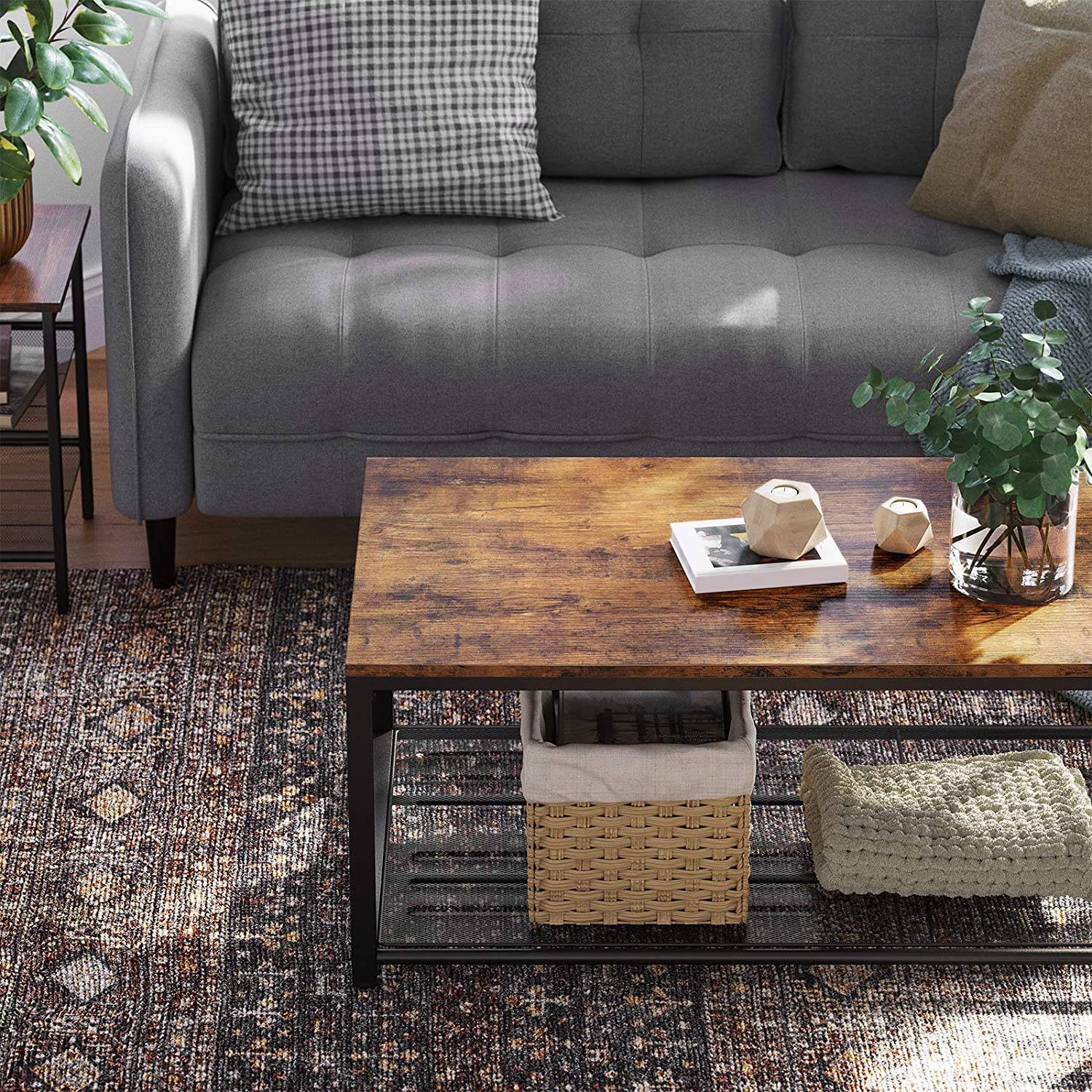 Rustic brown coffee table with dense mesh shelf and black iron legs, perfect for living room decor.