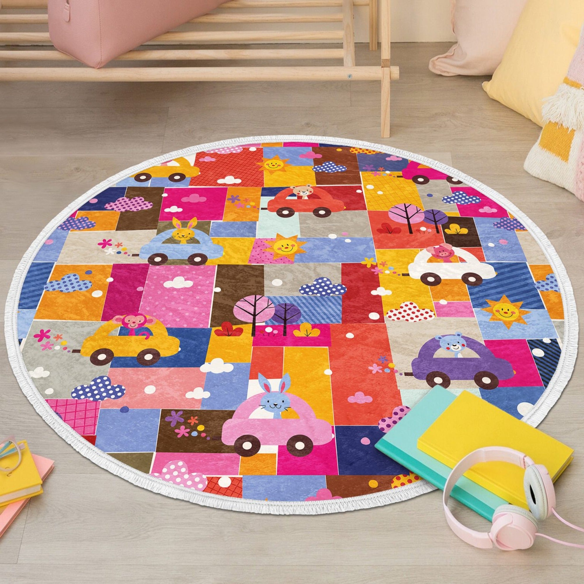 Colorful round rug featuring cute animal prints including a rabbit, monkey, and teddy bear, designed for kids' rooms.