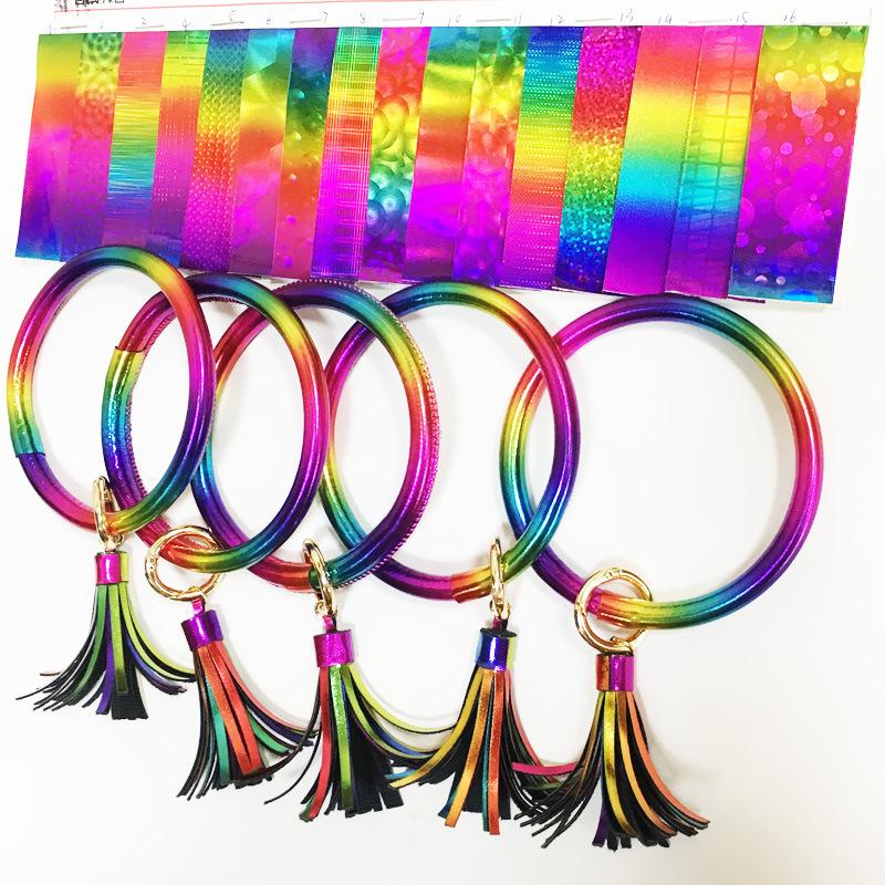 Colors PU Leather Round Tassel Bracelet Keychain for Women, featuring vibrant colors and stylish tassel design.