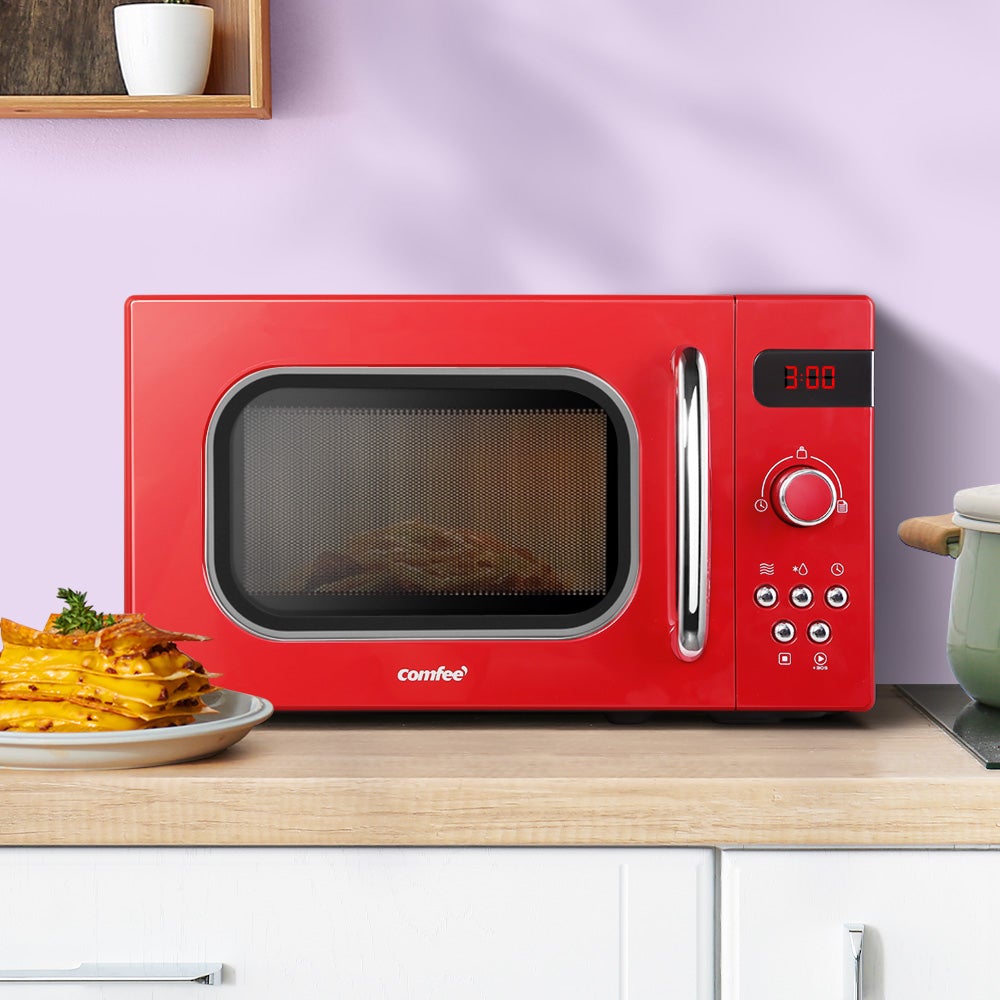 Comfee 20L Microwave Oven in red color with LED display and turntable, showcasing its retro design and user-friendly features.