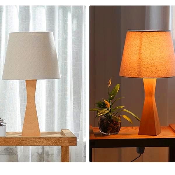 Concise Modern Style Table Lamp made of high-grade wood and cloth materials, featuring a warm white light and elegant design suitable for various home settings.