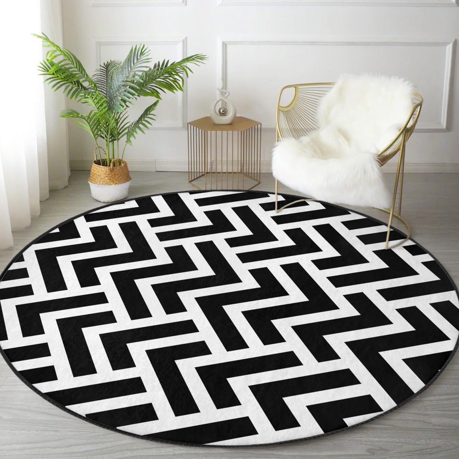 Contemporary round rug featuring a black and white zigzag pattern, made from soft velvet fabric, ideal for modern home decor.