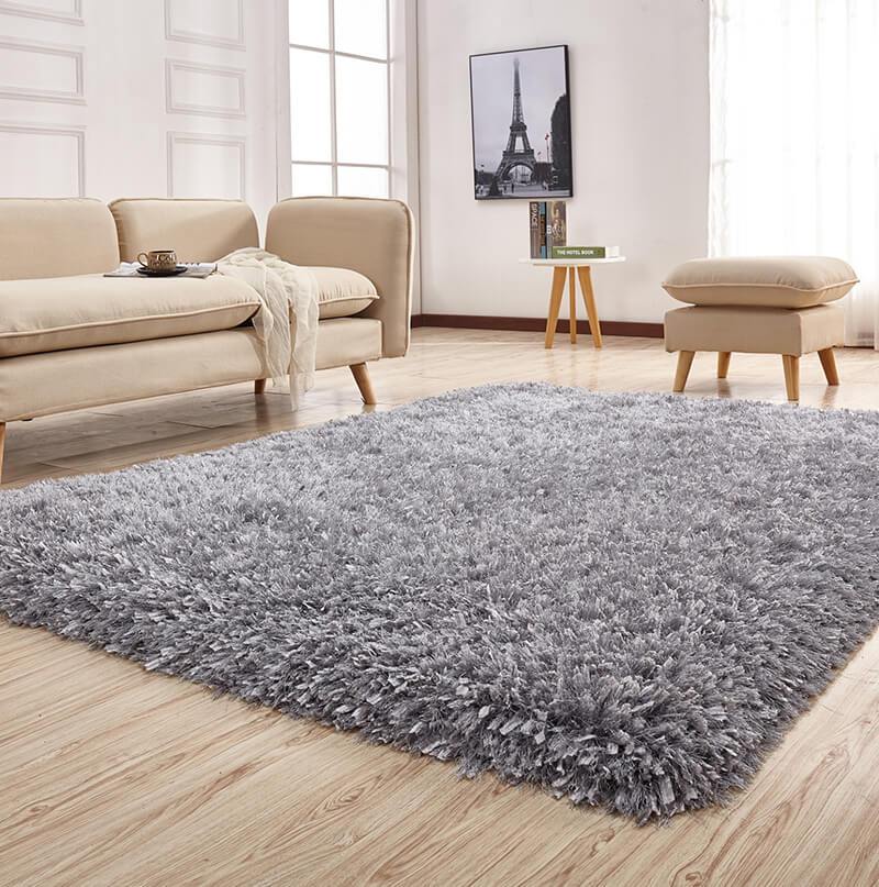 Coral Platinum Shag Area Rug in silver, showcasing its plush high-pile texture and elegant design.