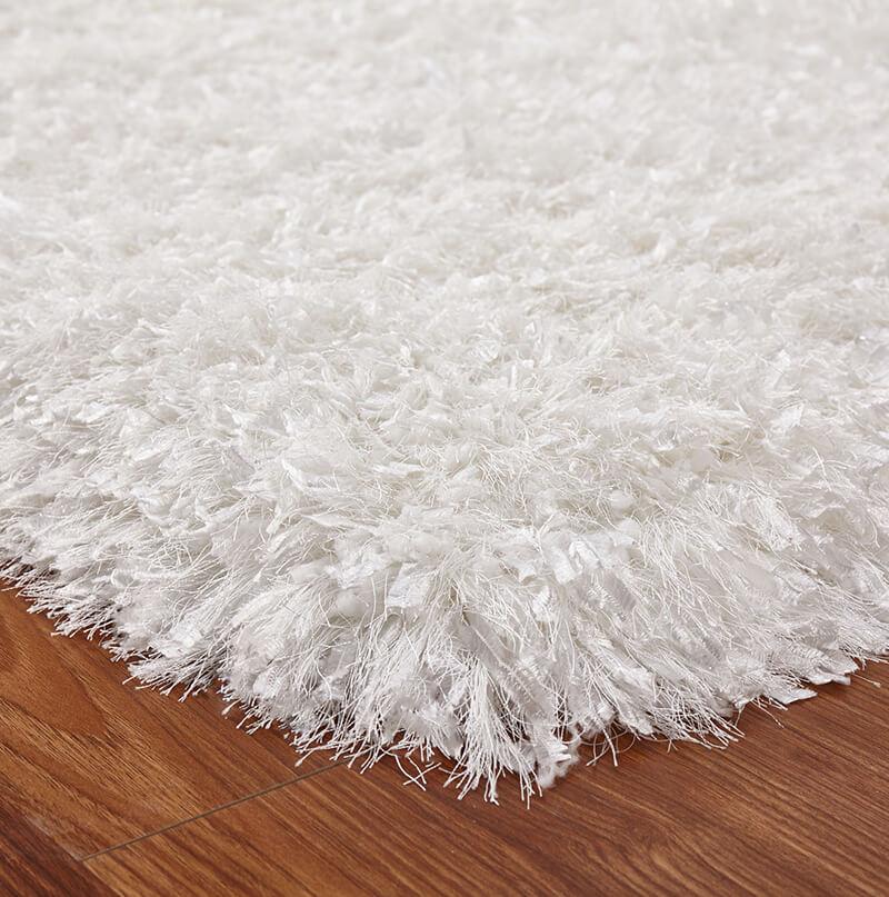 Coral Shag Area Rug in White with high-pile texture, showcasing its luxurious softness and elegant design.