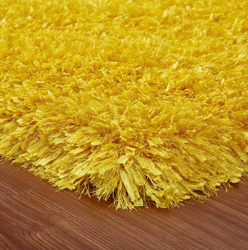 Coral Shag Area Rug in vibrant yellow, showcasing plush high-pile texture and stylish design, perfect for home decor.