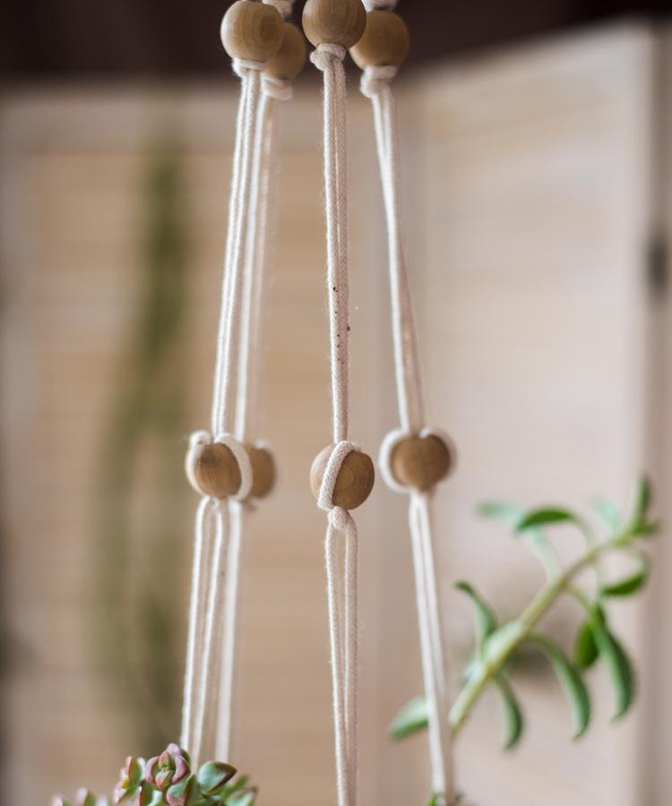 Cotton Hemp Rope Planter Hanger in beige, showcasing its durable design and multiple lengths for versatile plant display.