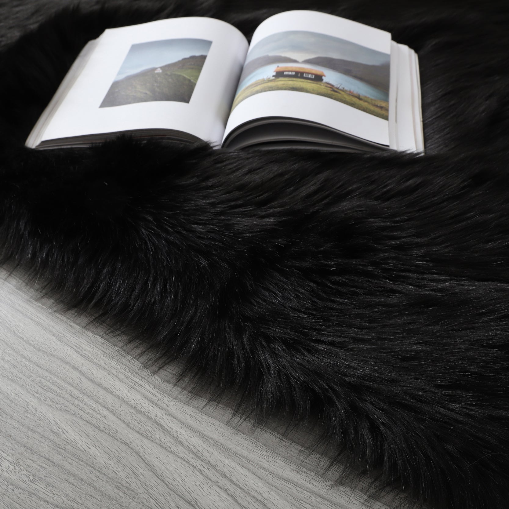 Cozy Ultra Soft Fluffy Faux Fur Black Area Rug showcasing its plush texture and elegant design, perfect for enhancing any living space.