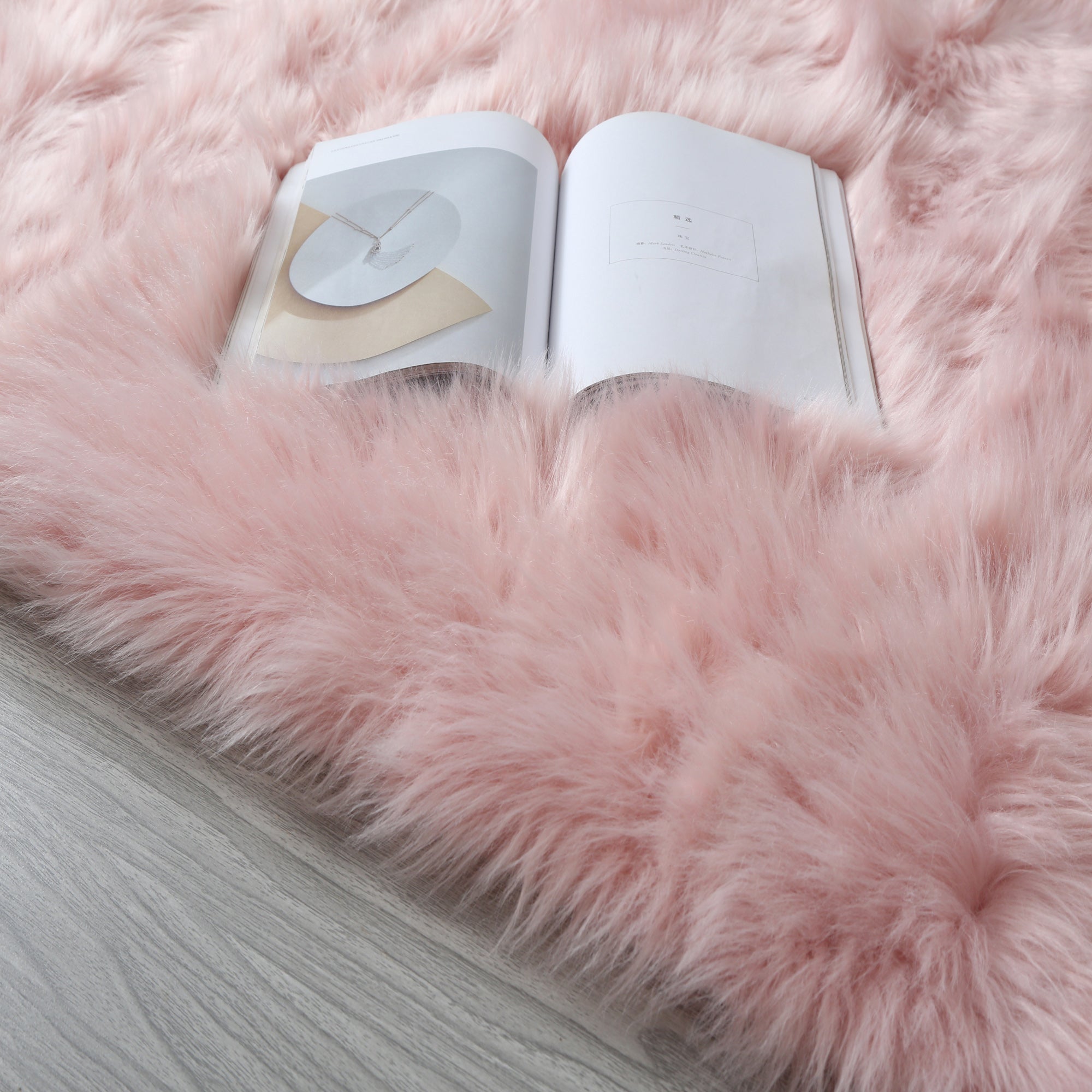 Cozy Ultra Soft Fluffy Faux Fur Pink Area Rug showcasing its plush texture and vibrant color, perfect for enhancing contemporary living spaces.