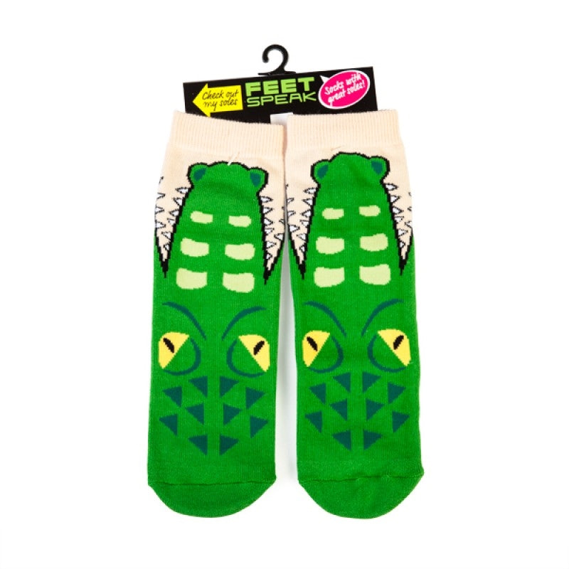 A pair of Croc Feet Speak Socks featuring a croc head design with 'BITE ME' printed on the bottom, showcasing their playful and unique style.