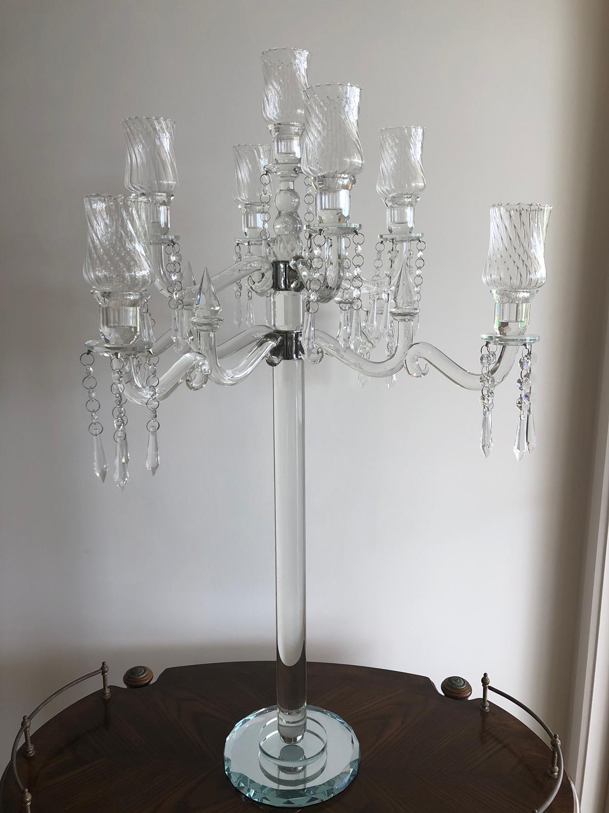 Elegant 9-head crystal candelabra standing 86cm tall, showcasing its intricate design and sparkling finish, perfect for weddings and events.