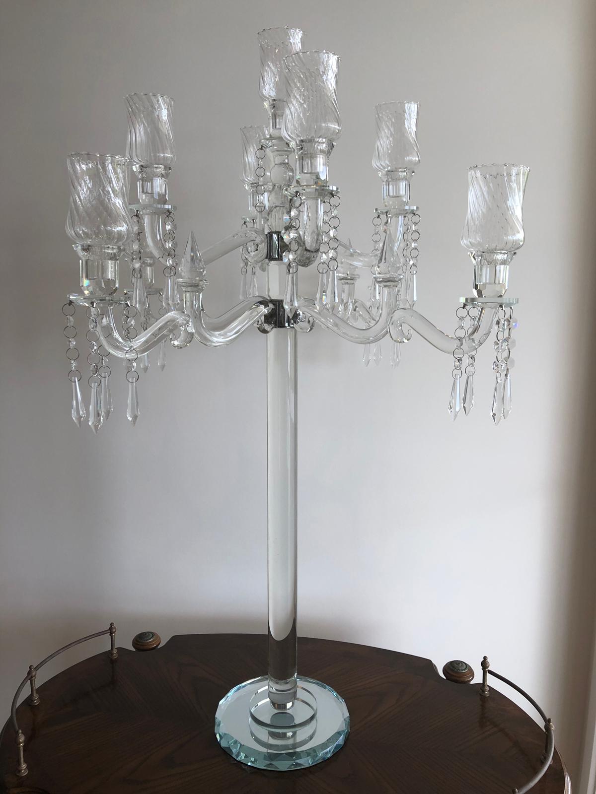 Elegant 9-head crystal candelabra standing 86cm tall, showcasing its intricate design and sparkling finish, perfect for weddings and events.