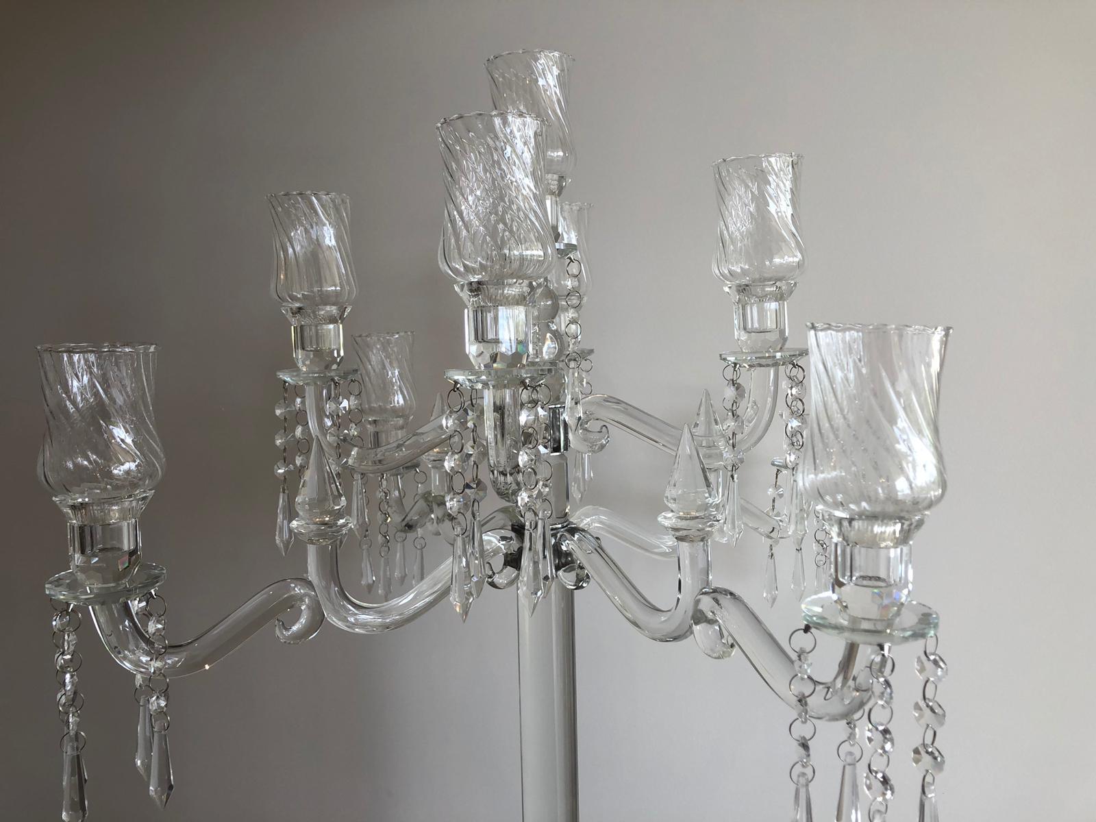 Elegant 9-head crystal candelabra standing 86cm tall, showcasing its intricate design and sparkling finish, perfect for weddings and events.