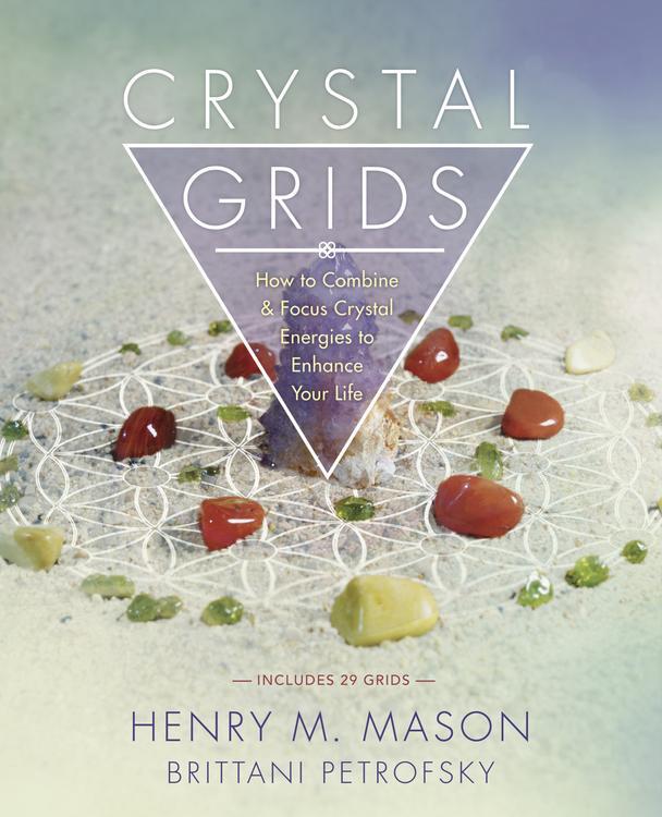 A beautifully arranged crystal grid featuring various crystals in a geometric pattern, symbolizing energy and intention.