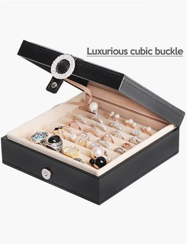 Cubic Buckle Ring Organizer featuring 9 slots, integrated mirror, and luxurious velvet interior.