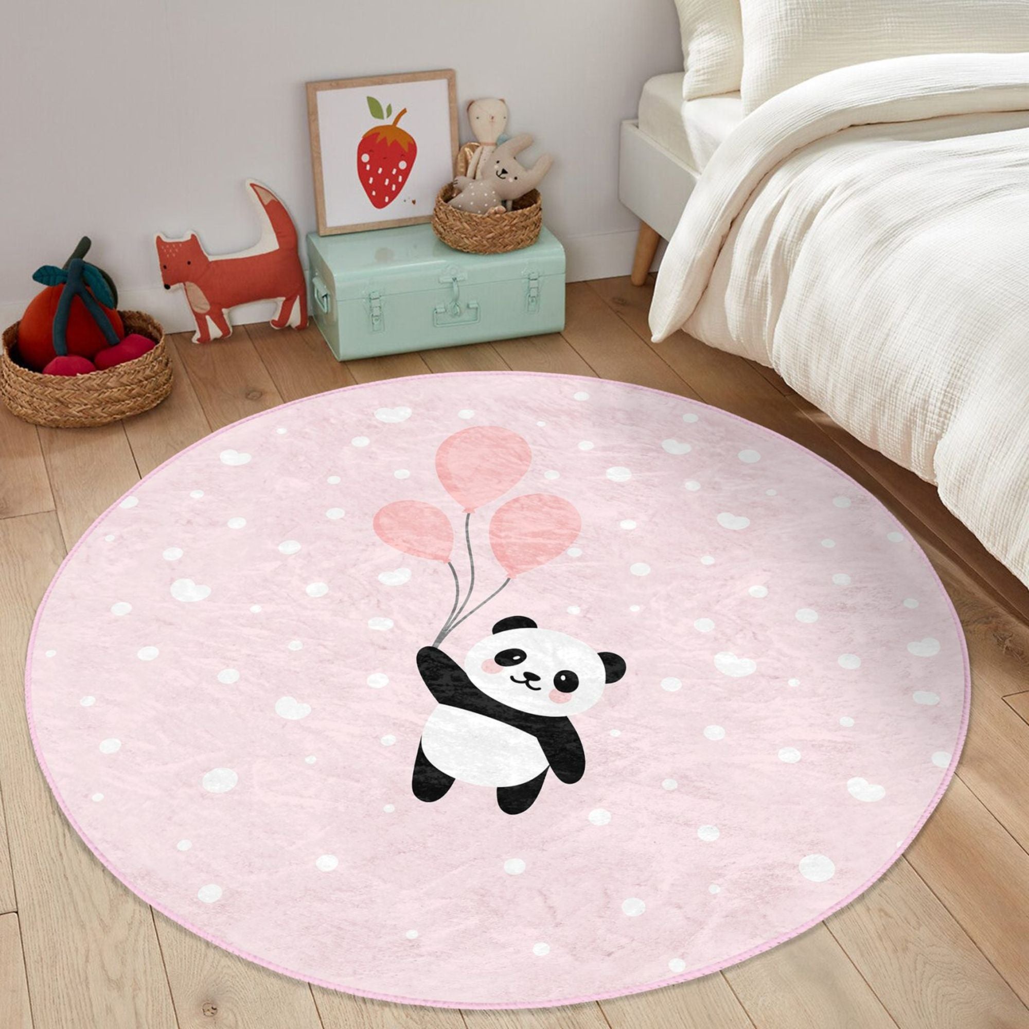 Cute pink rug featuring a panda with colorful balloons, perfect for girls' rooms, made from soft cotton material.