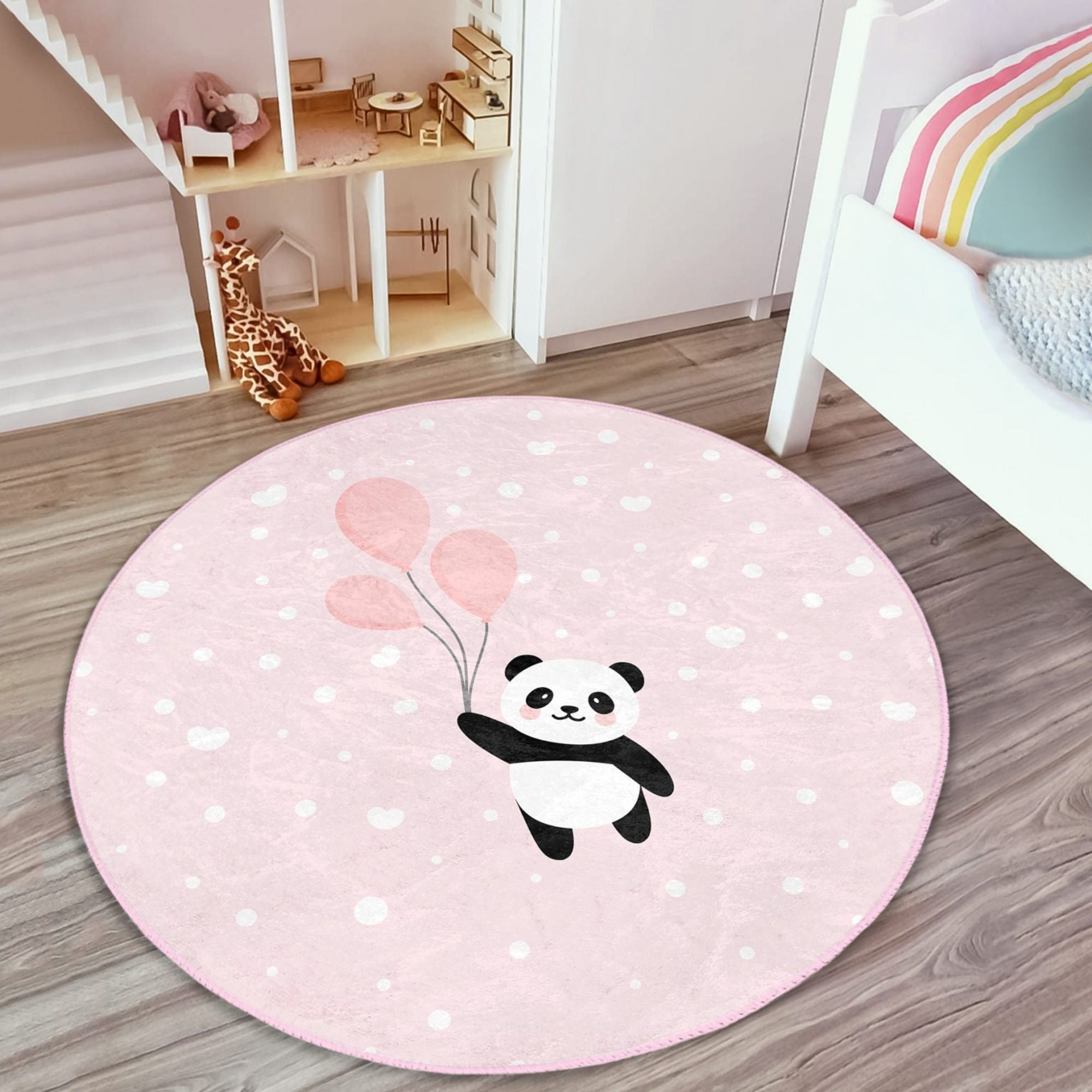 Cute pink rug featuring a panda with colorful balloons, perfect for girls' rooms, made from soft cotton material.