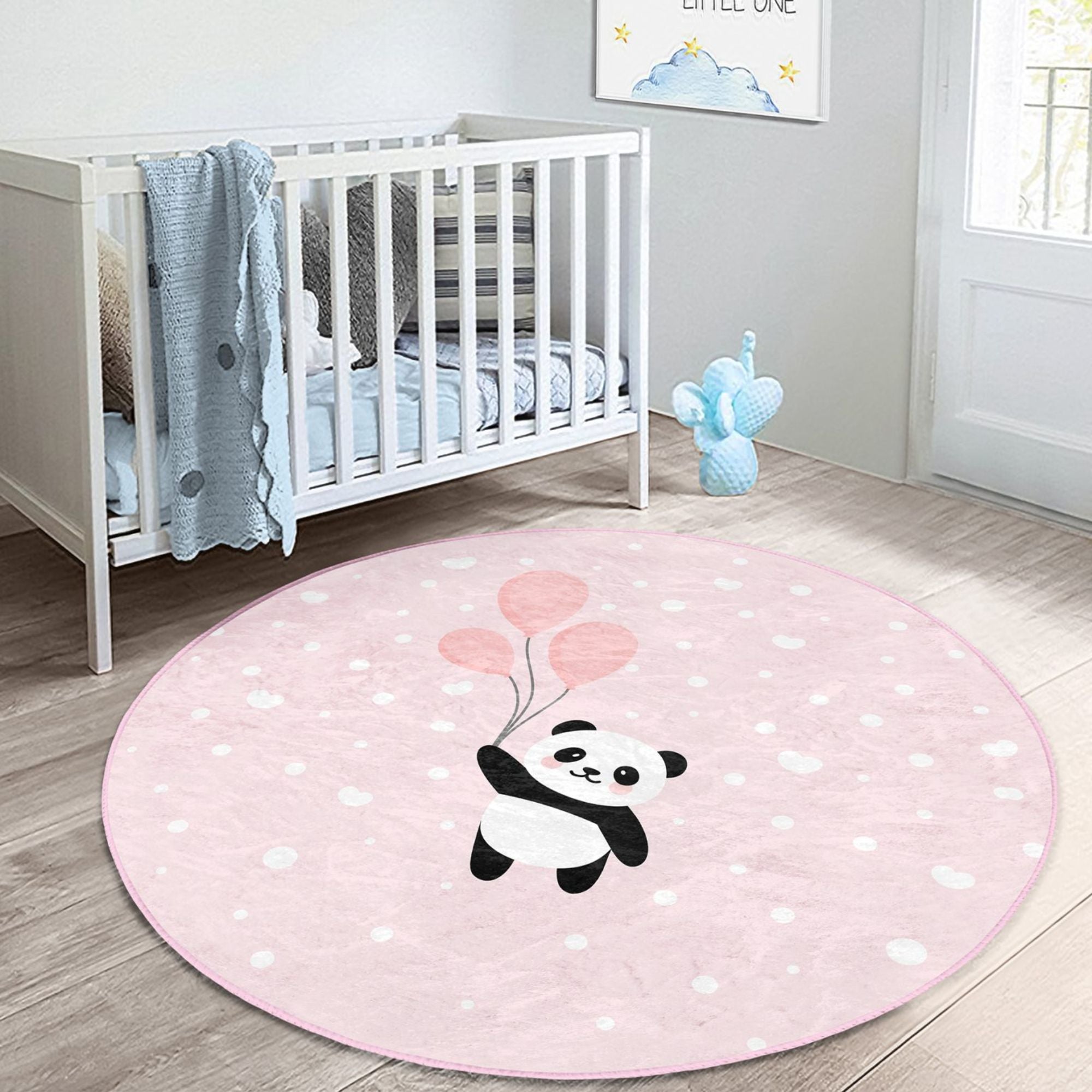 Cute pink rug featuring a panda with colorful balloons, perfect for girls' rooms, made from soft cotton material.