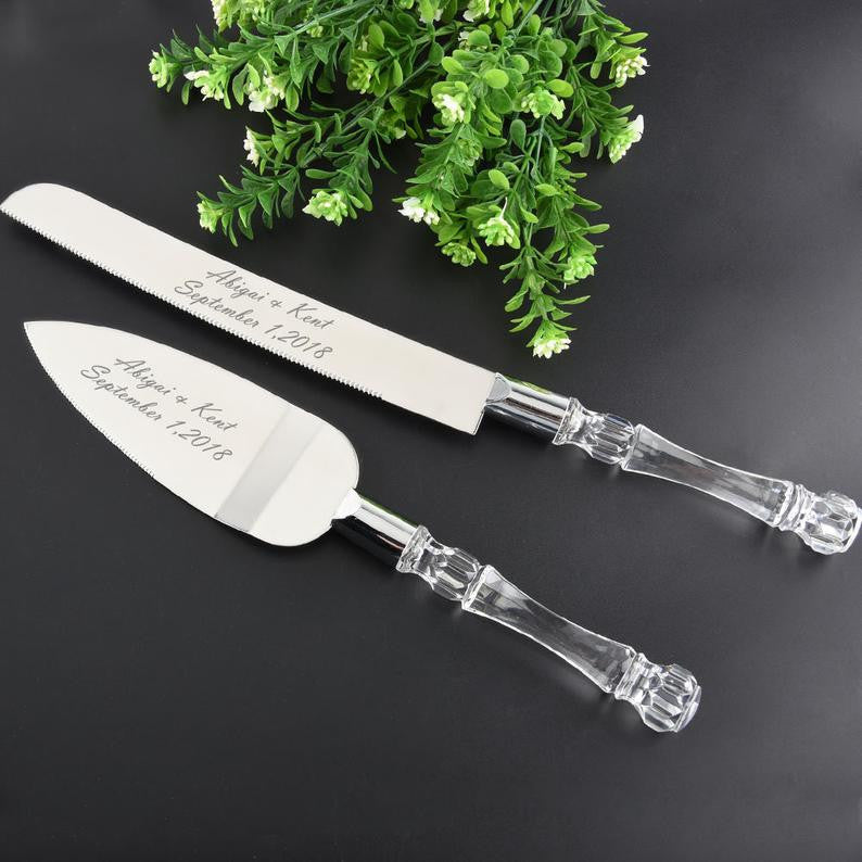 Elegant Cutting Cake Knife and Silver Blade Cake Server Set with clear molded handles and stainless steel blades, perfect for weddings.