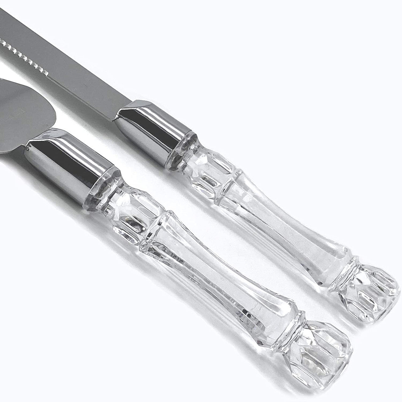 Elegant Cutting Cake Knife and Silver Blade Cake Server Set with clear molded handles and stainless steel blades, perfect for weddings.